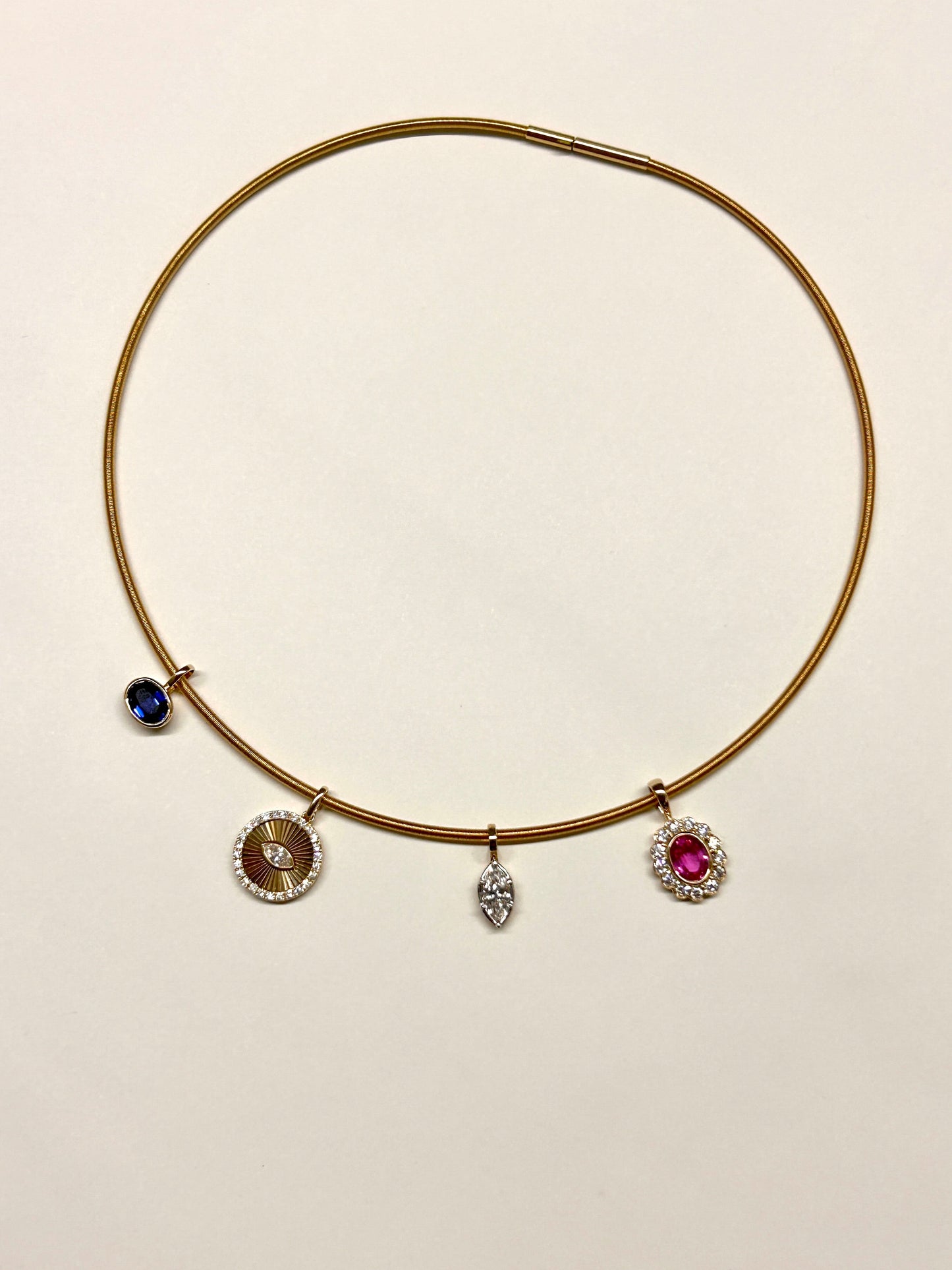 Guesthouse Meridian Choker featuring its charm pendants.