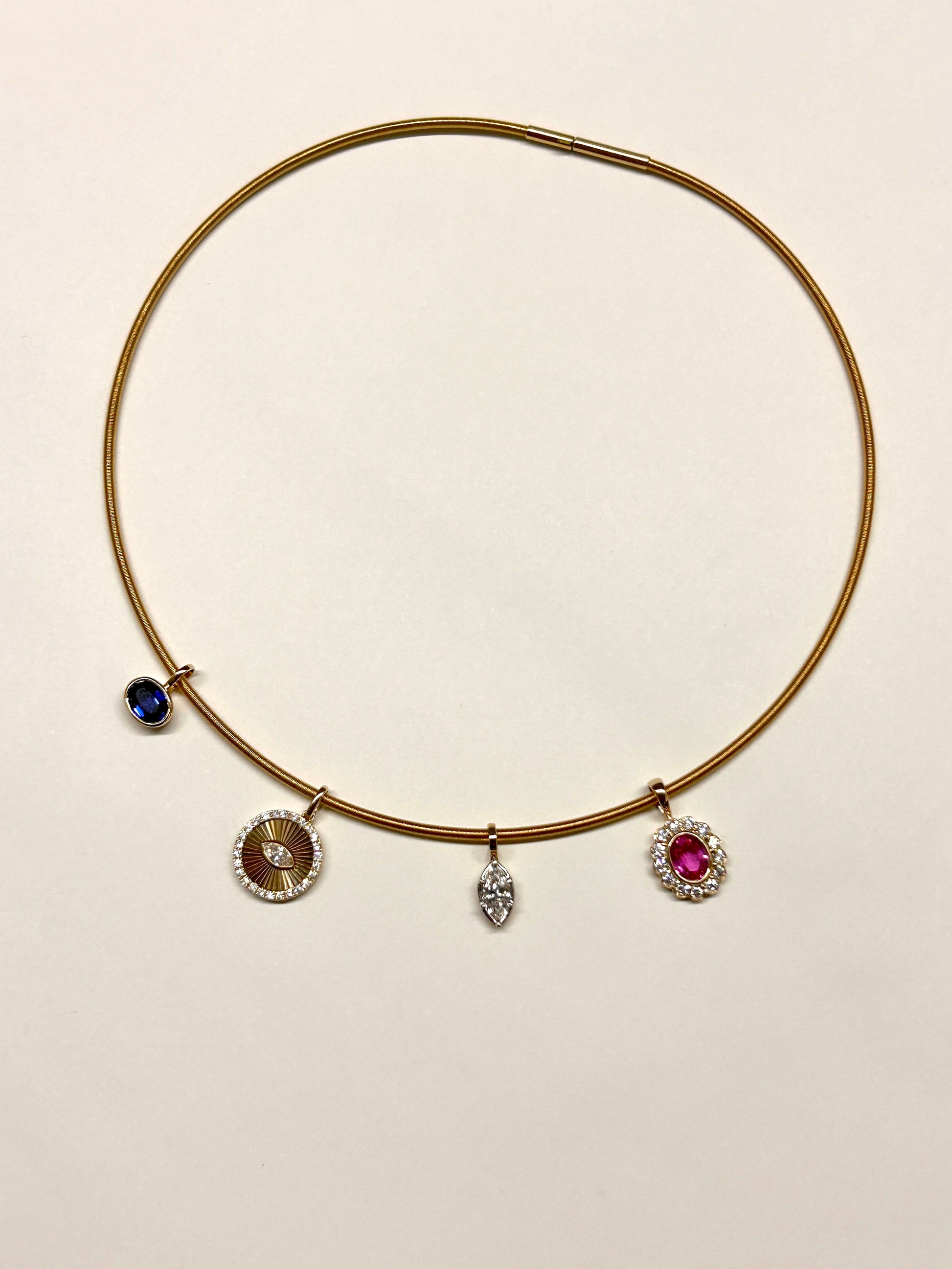 Guesthouse Meridian Choker featuring its charm pendants.