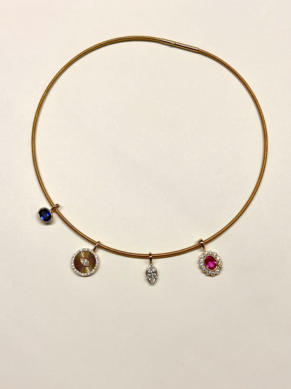Guesthouse Meridian Choker featuring its charm pendants.
